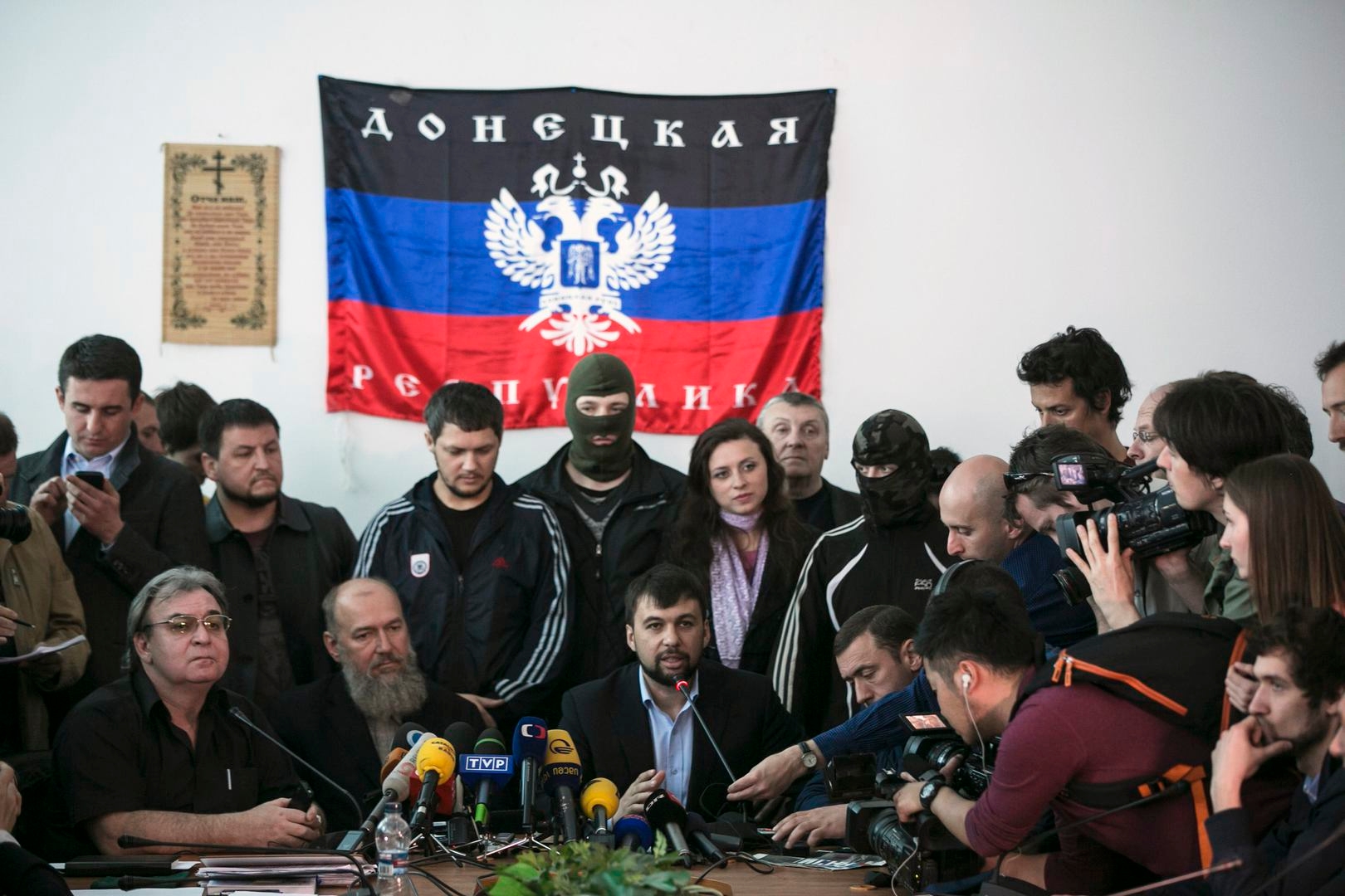 The head of pro-Russian separatists government Denis Pushilin speaks during news conference in regional government building in Donetsk